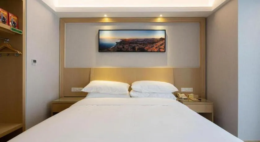Bed in Vienna Hotel Guangzhou Huadu Financial Center Sunac Amusement Park