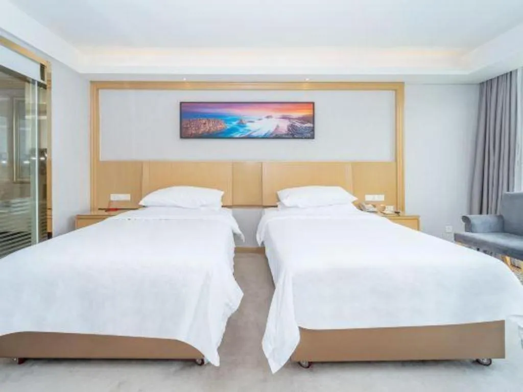 Bed in Vienna Hotel Guangzhou Huadu Financial Center Sunac Amusement Park
