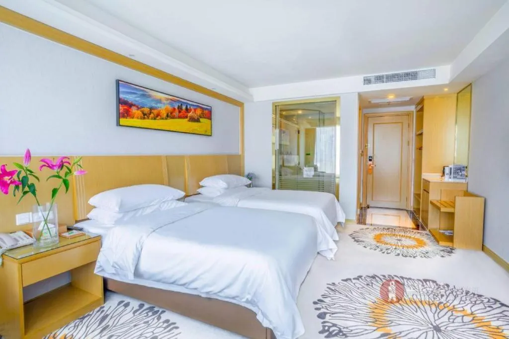 Bed in Vienna Hotel Guangzhou Huadu Financial Center Sunac Amusement Park