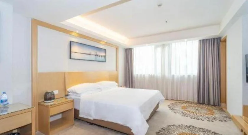 Bed in Vienna Hotel Guangzhou Huadu Financial Center Sunac Amusement Park