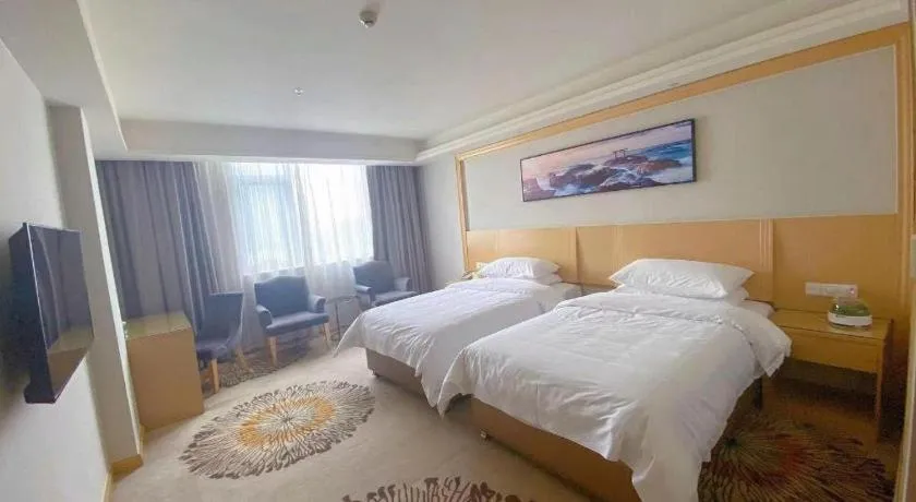 Bed in Vienna Hotel Guangzhou Huadu Financial Center Sunac Amusement Park