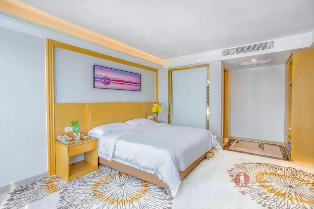 Bed in Vienna Hotel Guangzhou Huadu Financial Center Sunac Amusement Park