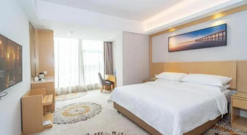 Bed in Vienna Hotel Guangzhou Huadu Financial Center Sunac Amusement Park