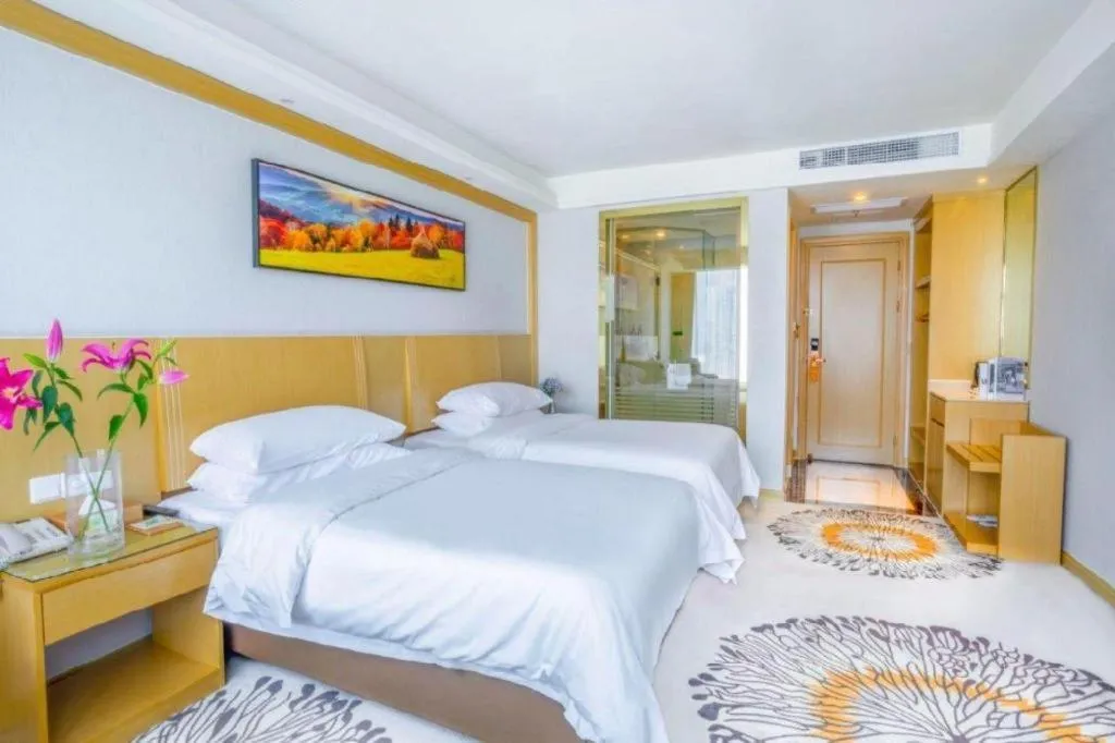 Bed in Vienna Hotel Guangzhou Huadu Financial Center Sunac Amusement Park