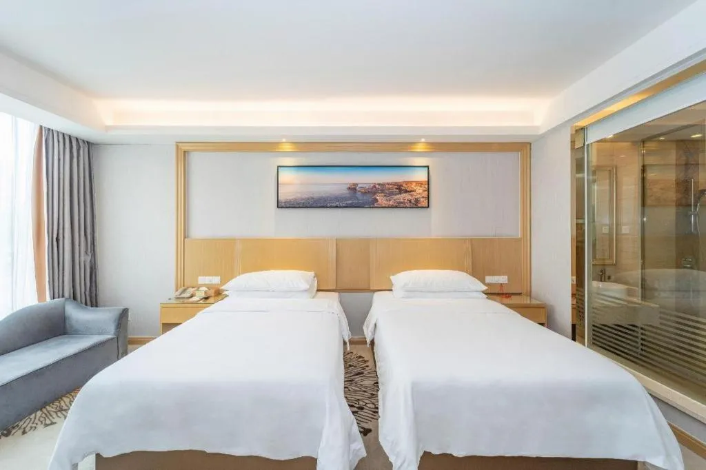 Bed in Vienna Hotel Guangzhou Huadu Financial Center Sunac Amusement Park