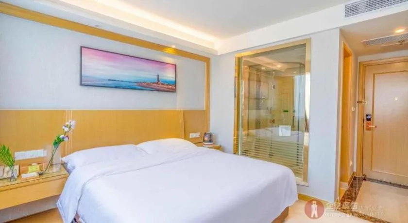 Bed in Vienna Hotel Guangzhou Huadu Financial Center Sunac Amusement Park