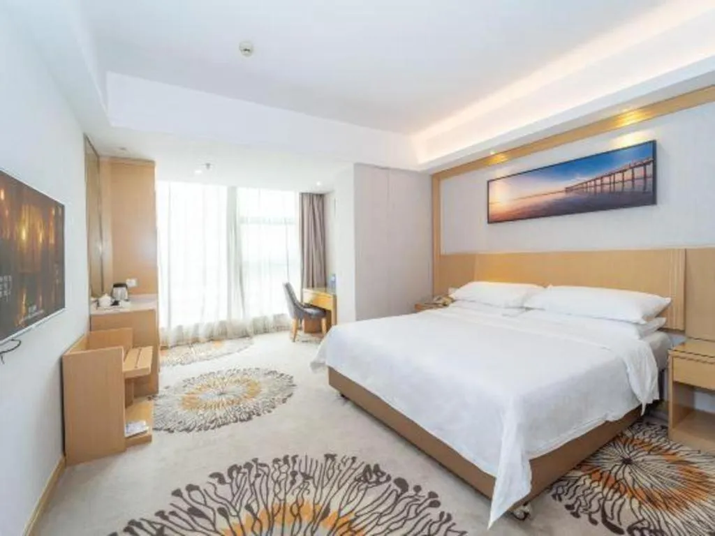 Bed in Vienna Hotel Guangzhou Huadu Financial Center Sunac Amusement Park