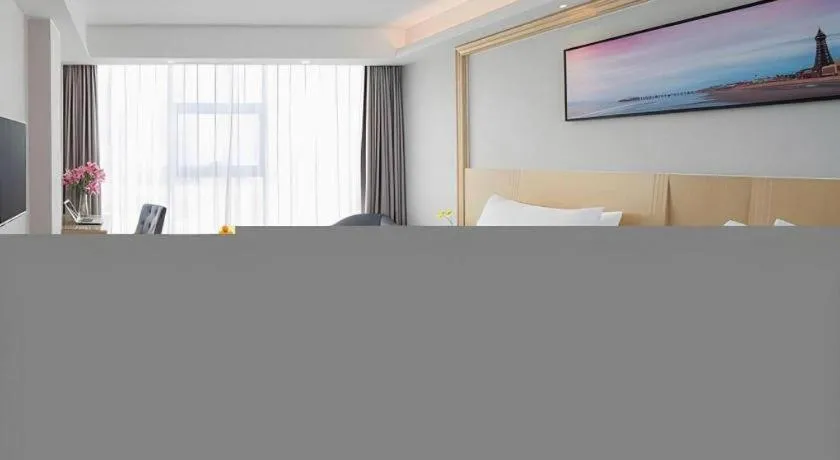 Bed in Vienna Hotel Guangzhou Huadu Financial Center Sunac Amusement Park