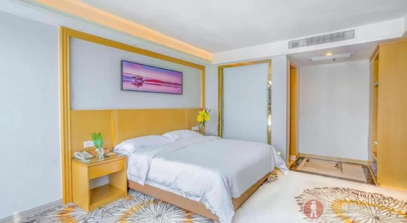 Bed in Vienna Hotel Guangzhou Huadu Financial Center Sunac Amusement Park
