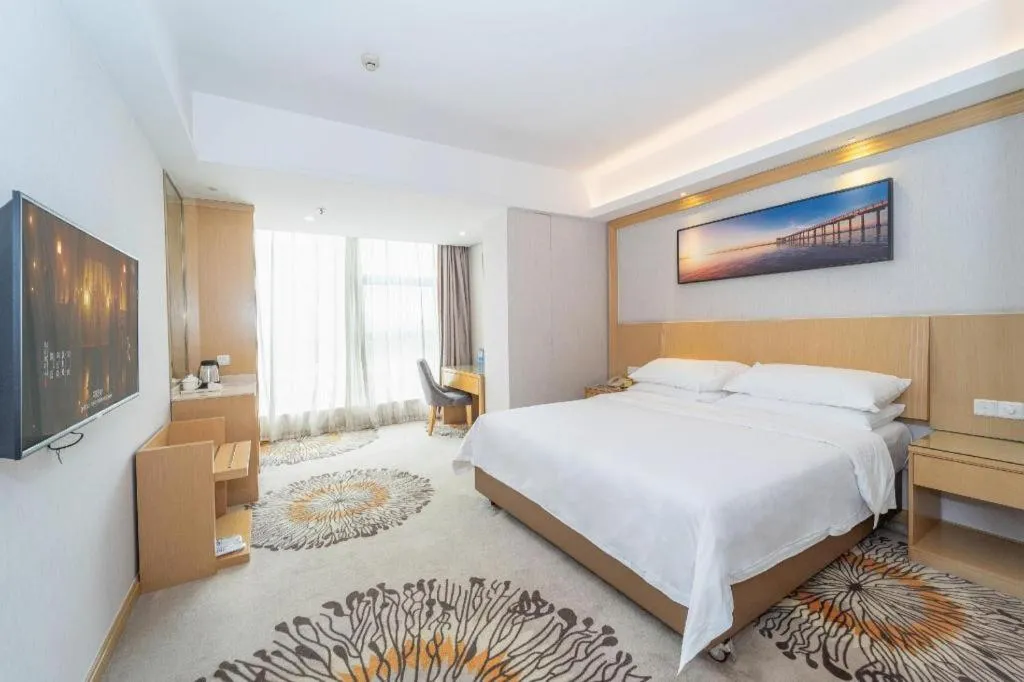 Bed in Vienna Hotel Guangzhou Huadu Financial Center Sunac Amusement Park