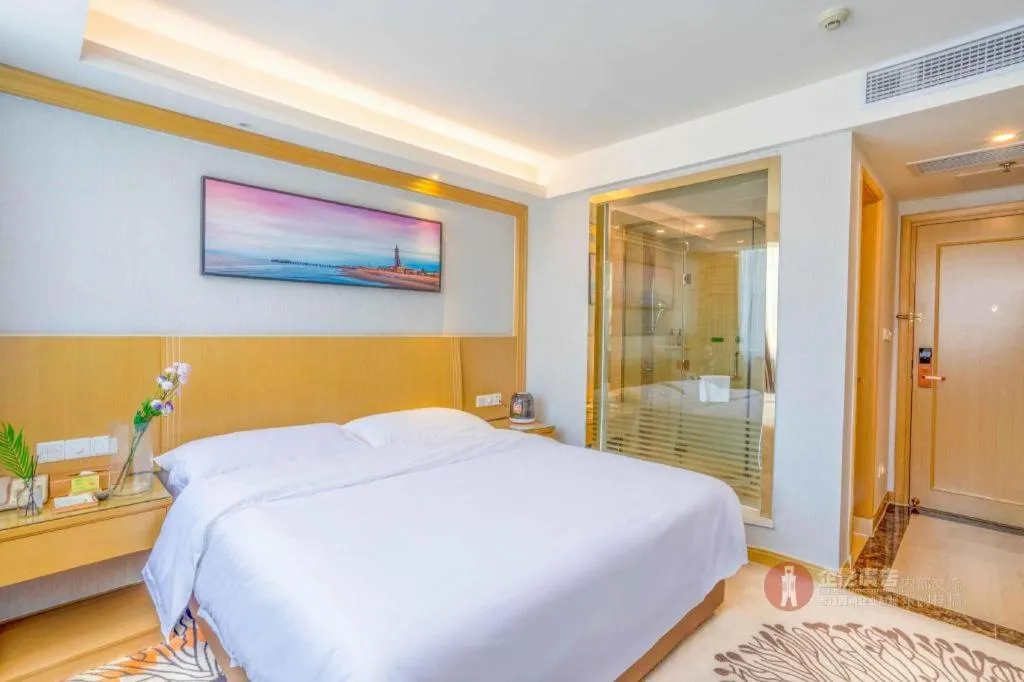 Bed in Vienna Hotel Guangzhou Huadu Financial Center Sunac Amusement Park