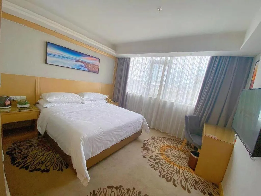 Bed in Vienna Hotel Guangzhou Huadu Financial Center Sunac Amusement Park