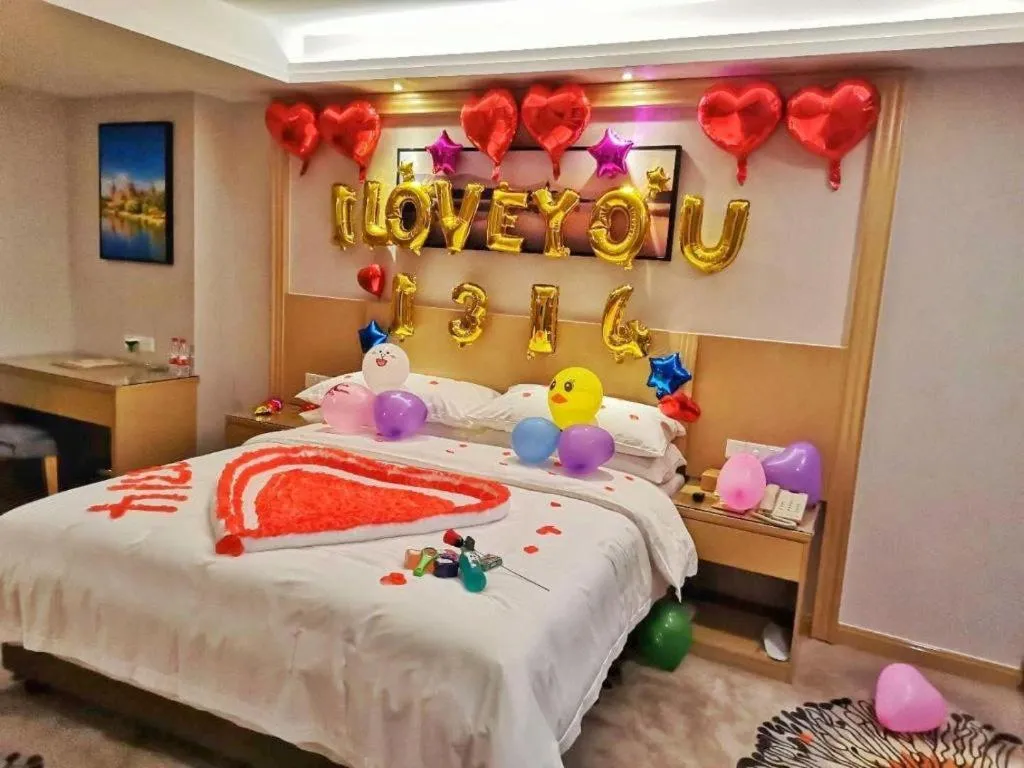 Bed in Vienna Hotel Guangzhou Huadu Financial Center Sunac Amusement Park