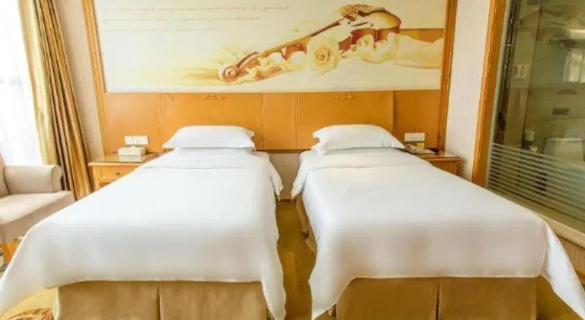 Bed in Vienna Hotel Jiangsu Kunshan Changjiang North Road Fenghuangcheng