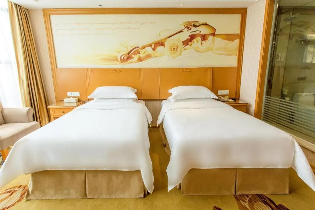Bed in Vienna Hotel Jiangsu Kunshan Changjiang North Road Fenghuangcheng