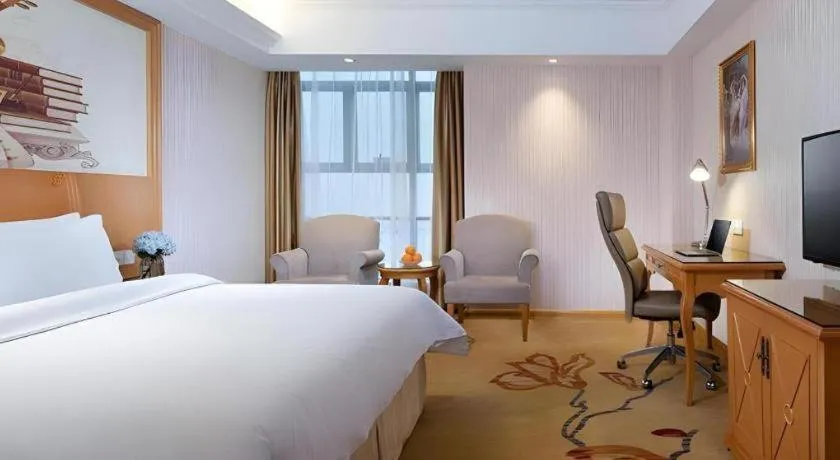Bed in Vienna Hotel Jiangsu Kunshan Changjiang North Road Fenghuangcheng