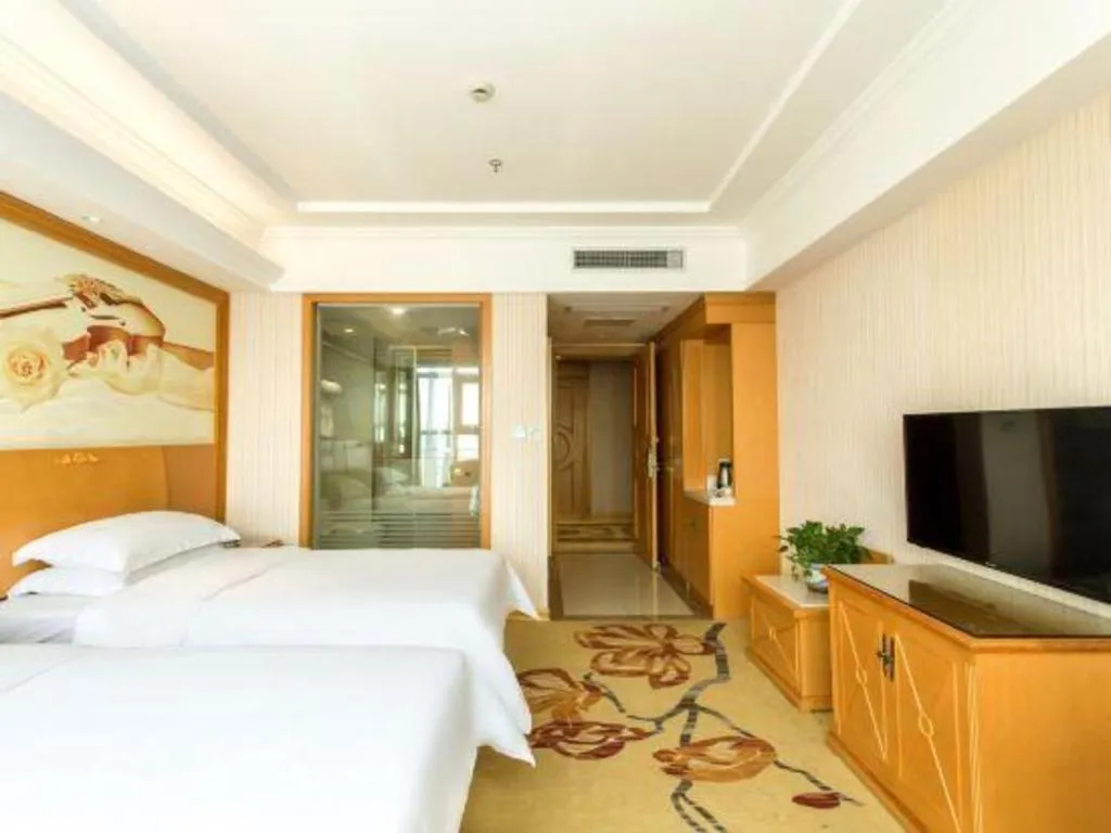 Bed in Vienna Hotel Jiangsu Kunshan Changjiang North Road Fenghuangcheng