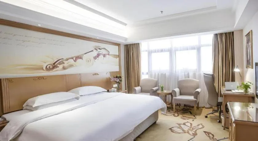 Bed in Vienna Hotel Jiangsu Kunshan Changjiang North Road Fenghuangcheng