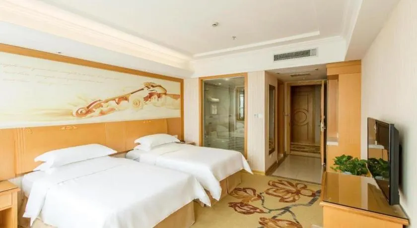 Bed in Vienna Hotel Jiangsu Kunshan Changjiang North Road Fenghuangcheng