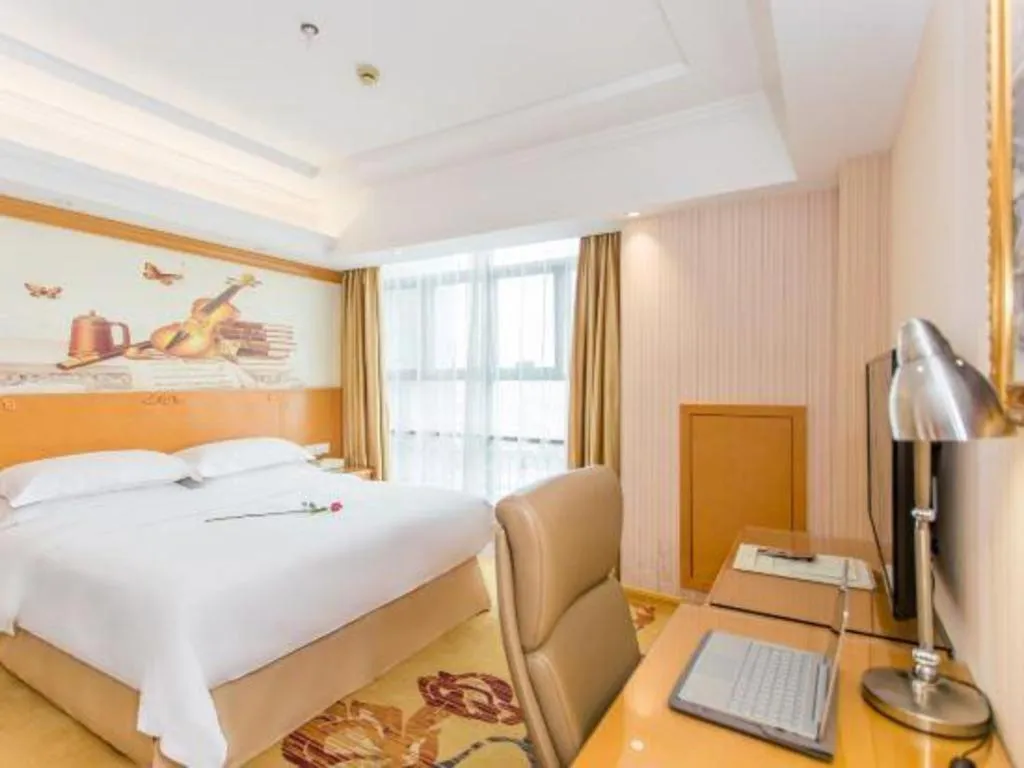 Bed in Vienna Hotel Jiangsu Kunshan Changjiang North Road Fenghuangcheng