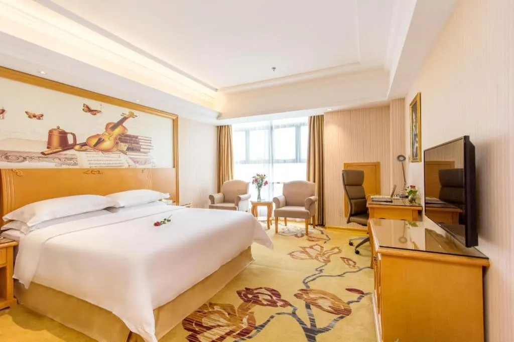 Bed in Vienna Hotel Jiangsu Kunshan Changjiang North Road Fenghuangcheng