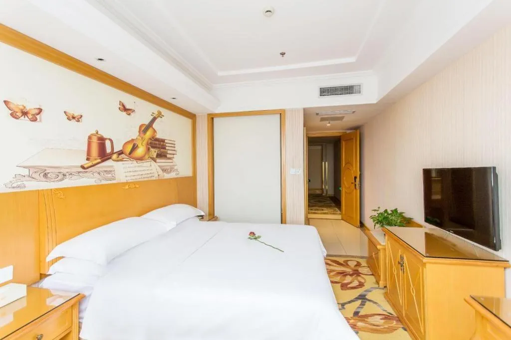 Bed in Vienna Hotel Jiangsu Kunshan Changjiang North Road Fenghuangcheng