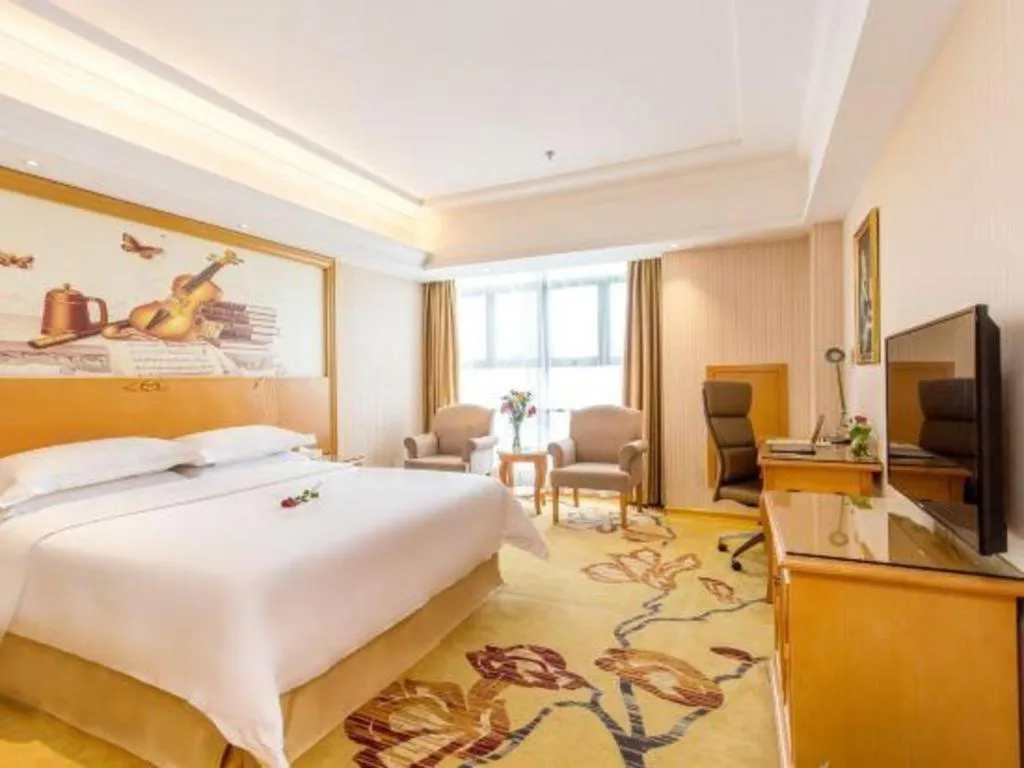 Bed in Vienna Hotel Jiangsu Kunshan Changjiang North Road Fenghuangcheng
