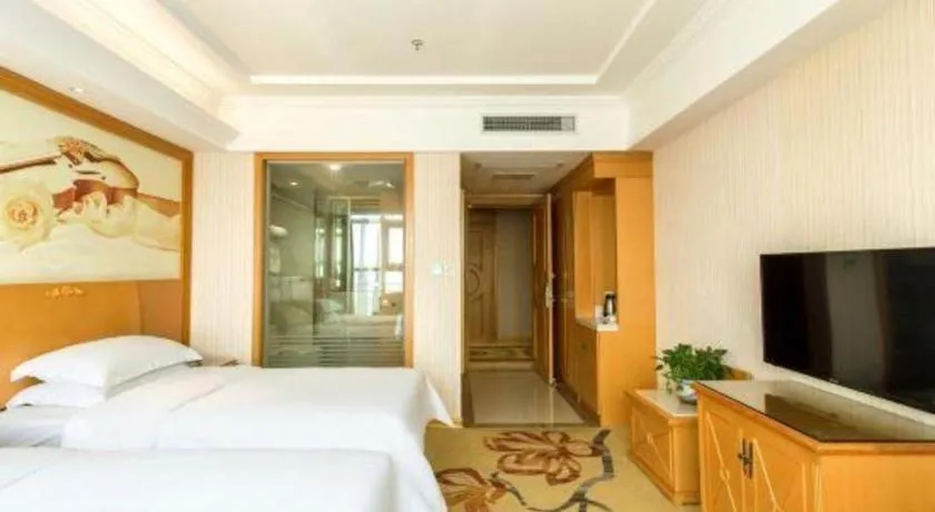 Bed in Vienna Hotel Jiangsu Kunshan Changjiang North Road Fenghuangcheng