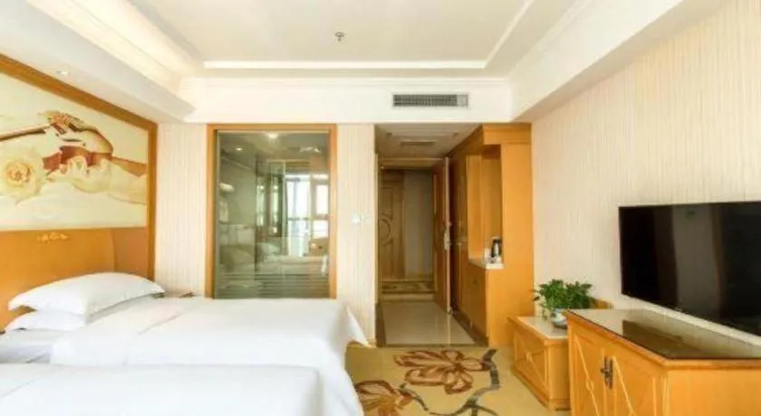 Bed in Vienna Hotel Jiangsu Kunshan Changjiang North Road Fenghuangcheng