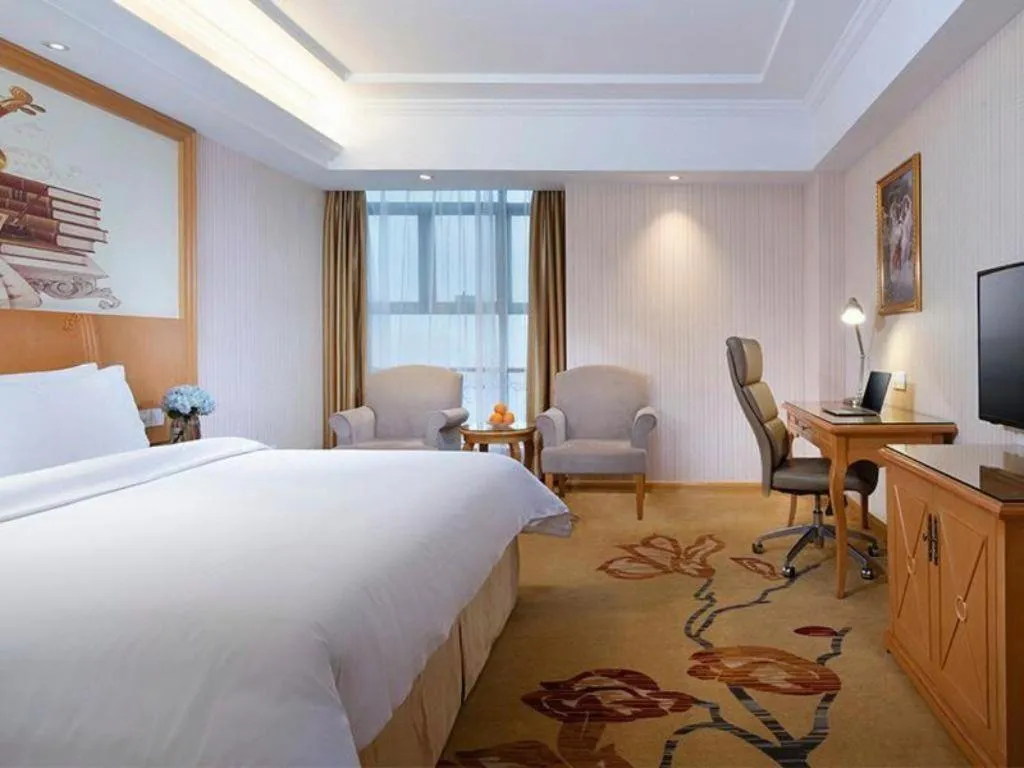 Bed in Vienna Hotel Jiangsu Kunshan Changjiang North Road Fenghuangcheng
