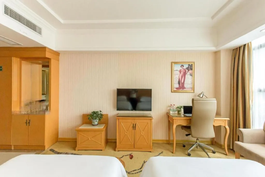 Bed in Vienna Hotel Jiangsu Kunshan Changjiang North Road Fenghuangcheng