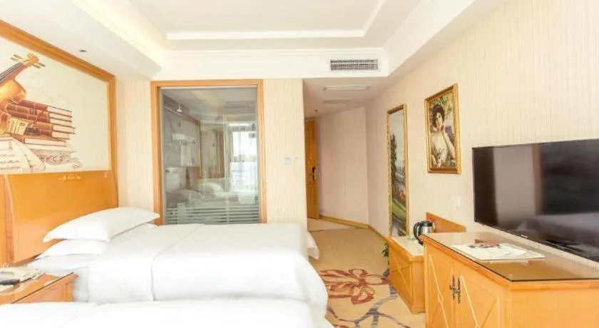 Bed in Vienna Hotel Jiangsu Kunshan Changjiang North Road Fenghuangcheng