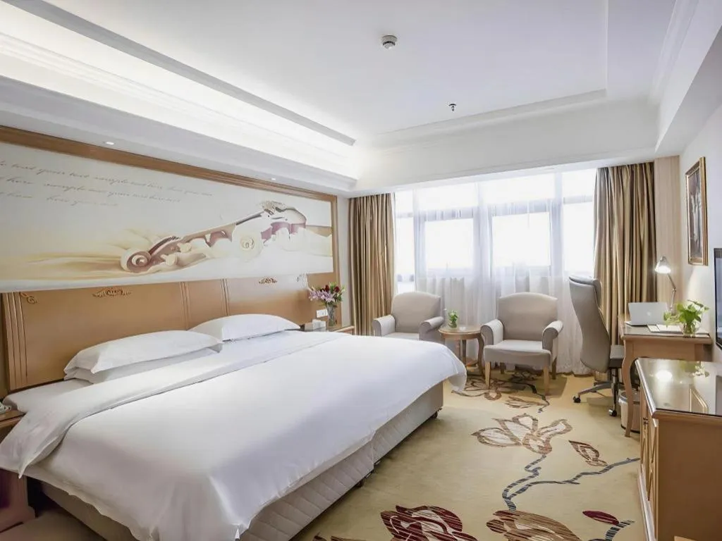 Bed in Vienna Hotel Jiangsu Kunshan Changjiang North Road Fenghuangcheng