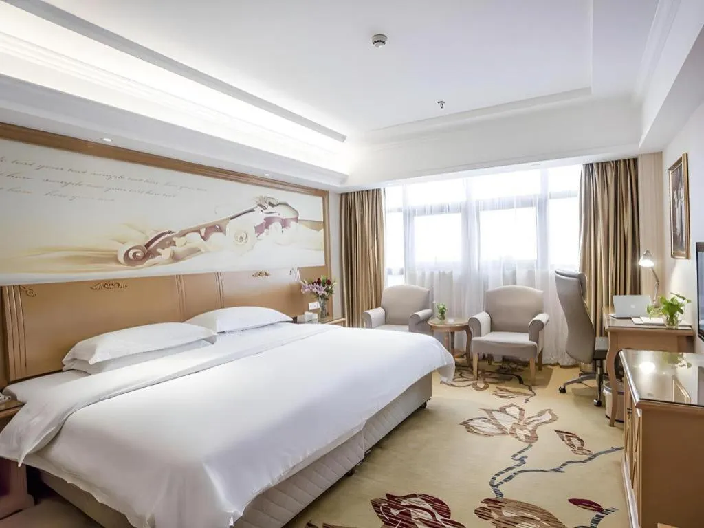 Bed in Vienna Hotel Jiangsu Kunshan Changjiang North Road Fenghuangcheng