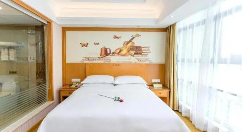 Bed in Vienna Hotel Jiangsu Kunshan Changjiang North Road Fenghuangcheng