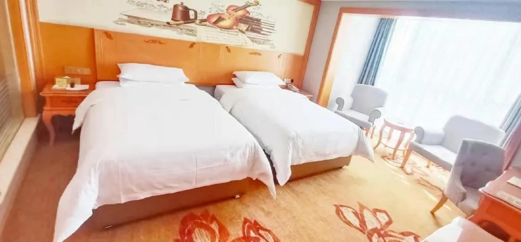 Bed in Vienna Hotel Guiyang North Station Dream City