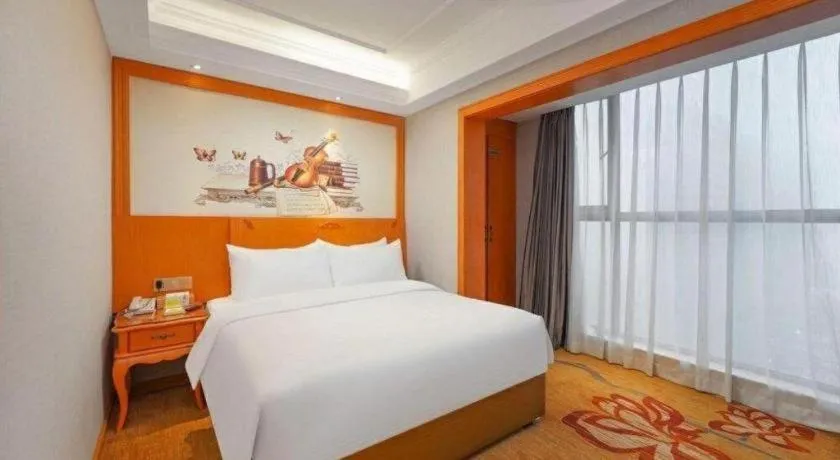 Bed in Vienna Hotel Guiyang North Station Dream City