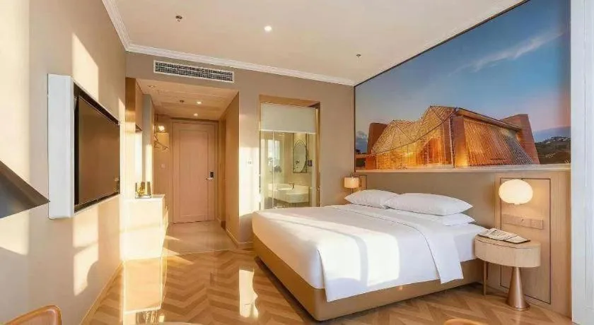 Bed in Vienna Hotel Jiangsu Dongtai Wanghai West Road