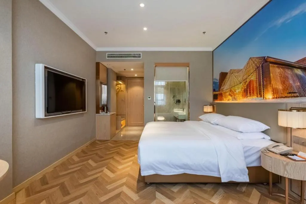 Bed in Vienna Hotel Jiangsu Dongtai Wanghai West Road