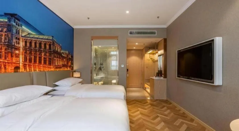 Bed in Vienna Hotel Jiangsu Dongtai Wanghai West Road