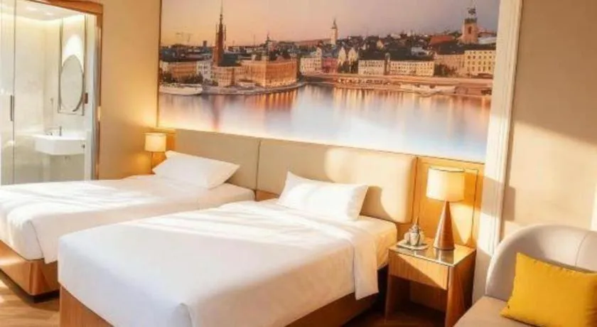 Bed in Vienna Hotel Jiangsu Dongtai Wanghai West Road