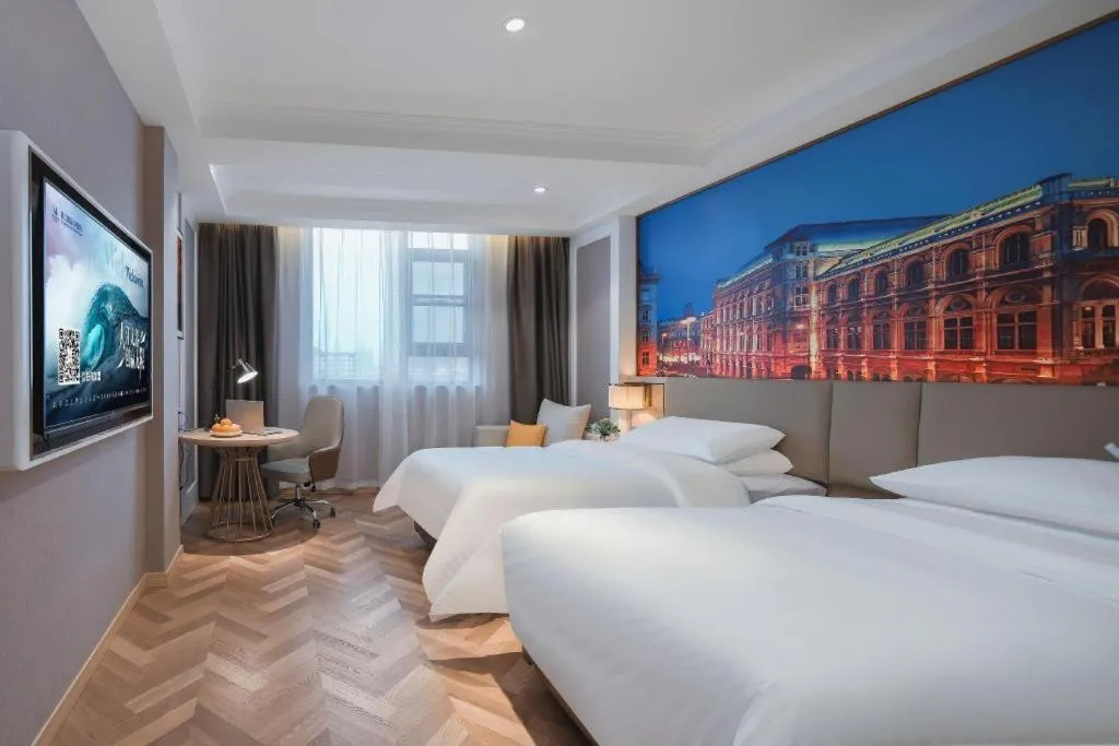 Bed in Vienna Hotel Jiangsu Dongtai Wanghai West Road