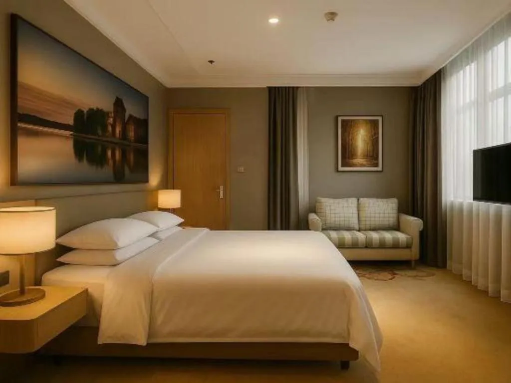 Bed in Vienna Hotel Jiangsu Dongtai Wanghai West Road