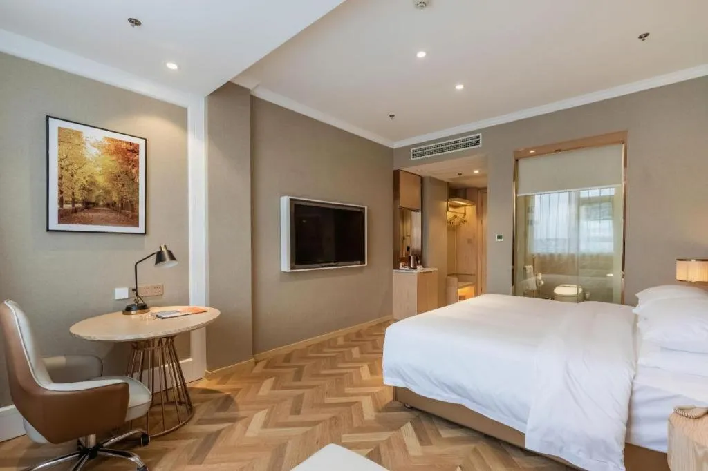 Bed in Vienna Hotel Jiangsu Dongtai Wanghai West Road