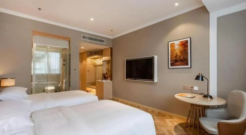 Bed in Vienna Hotel Jiangsu Dongtai Wanghai West Road