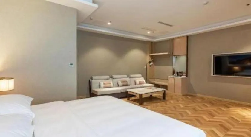 Bed in Vienna Hotel Jiangsu Dongtai Wanghai West Road