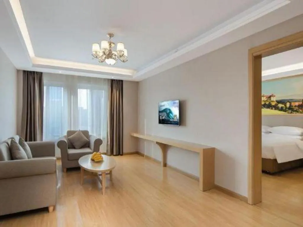 Bed in Vienna Hotel Jiangsu Dongtai Wanghai West Road