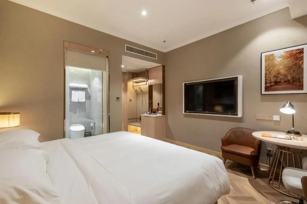 Bed in Vienna Hotel Jiangsu Dongtai Wanghai West Road