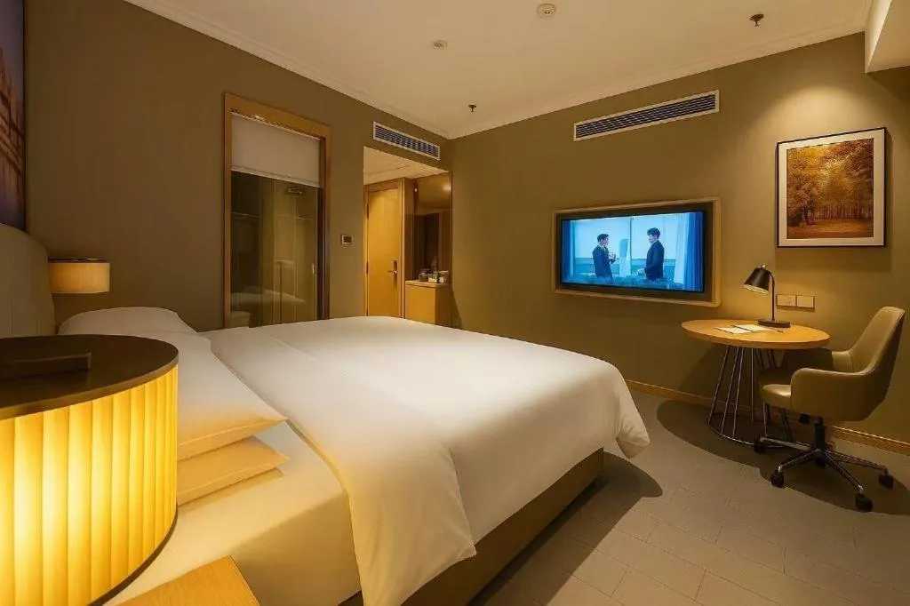 Bed in Vienna Hotel Jiangsu Dongtai Wanghai West Road