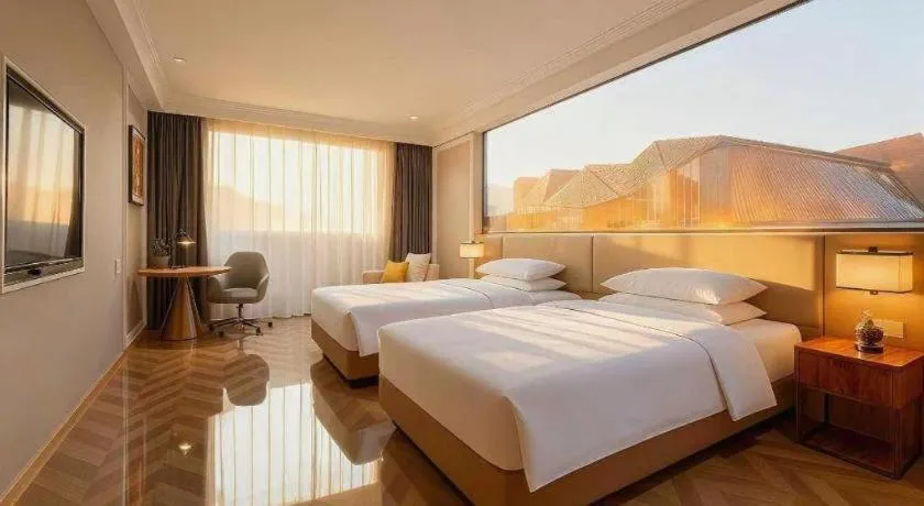 Bed in Vienna Hotel Jiangsu Dongtai Wanghai West Road